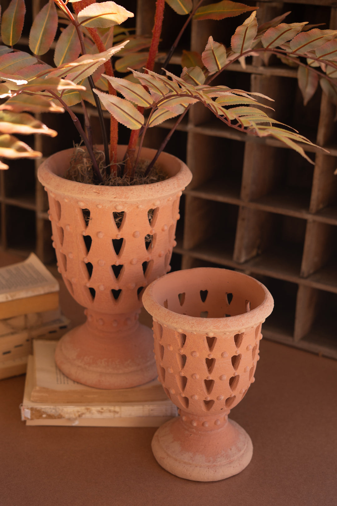 Set of 2 Concrete Perforated Urns with Terracotta Finish