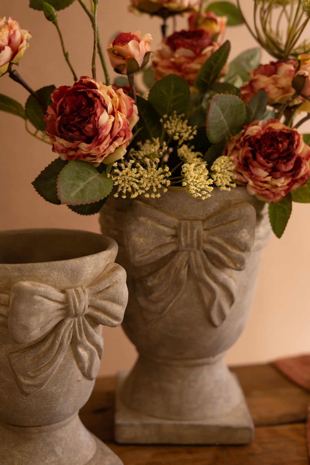 Set of 2 Concrete Urns with Bow Detail
