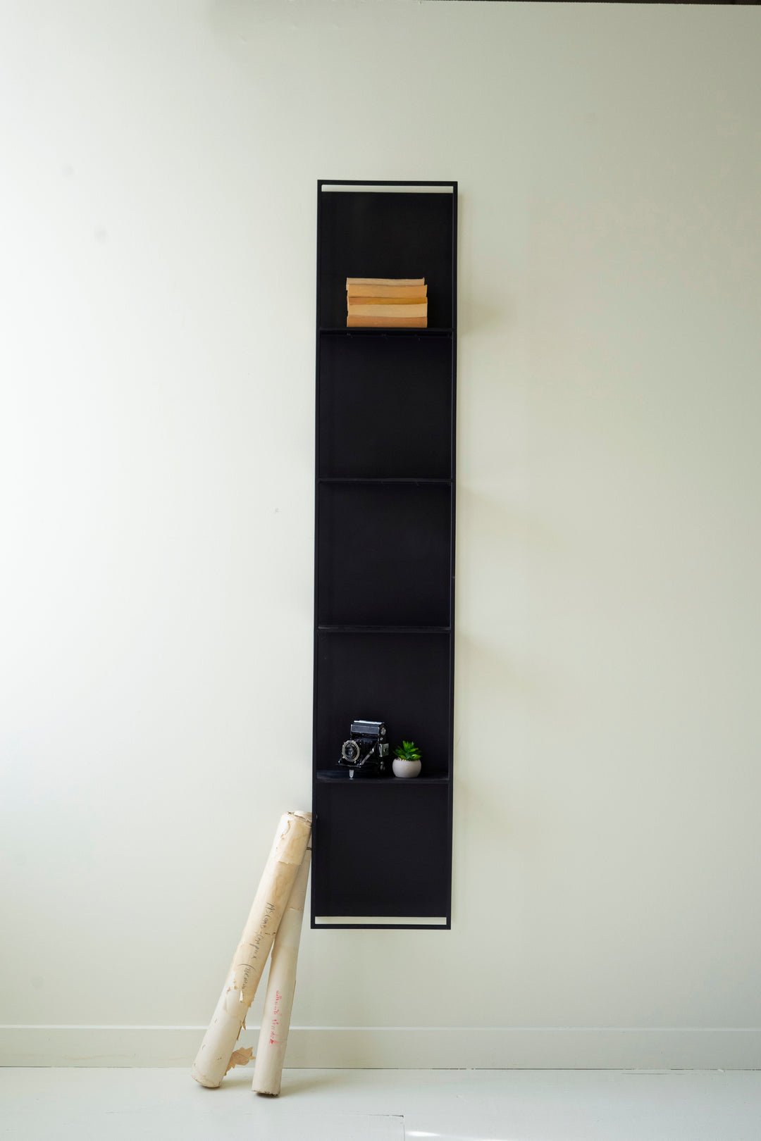 Tall Black Metal Four-Tiered Wall Shelf