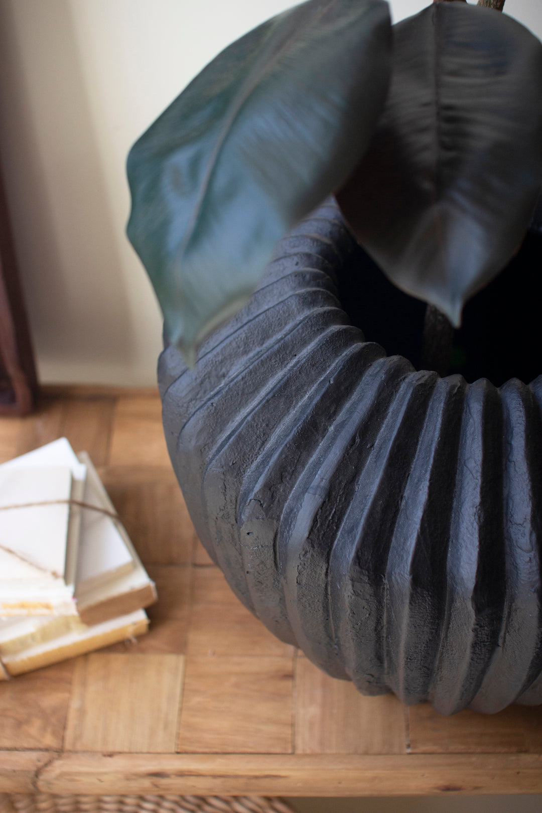Short Black Stone Composite Urn with Fluted Detail