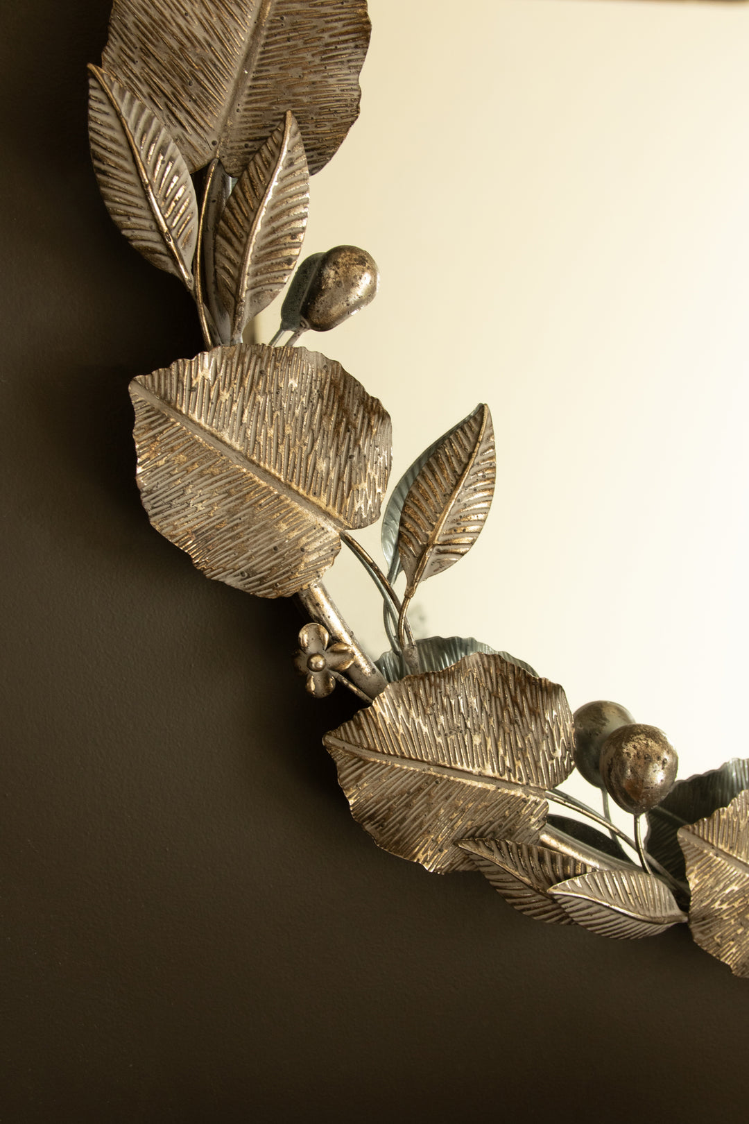 Round Rustic Metal Framed Mirror with Leaf and Fruit Detail