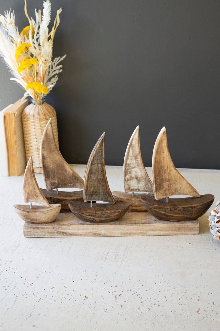 Five Wooden Sailboats on a Base