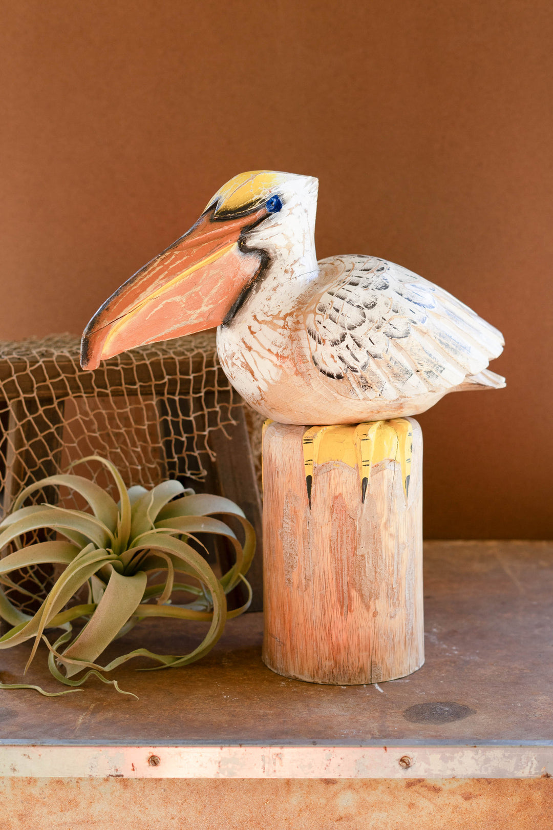 Carved Wood Pelican On A Piling
