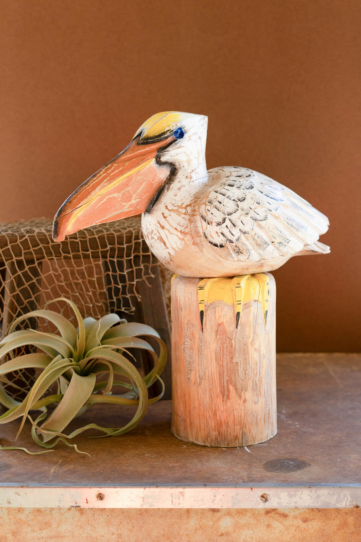 Carved Wood Pelican On A Piling