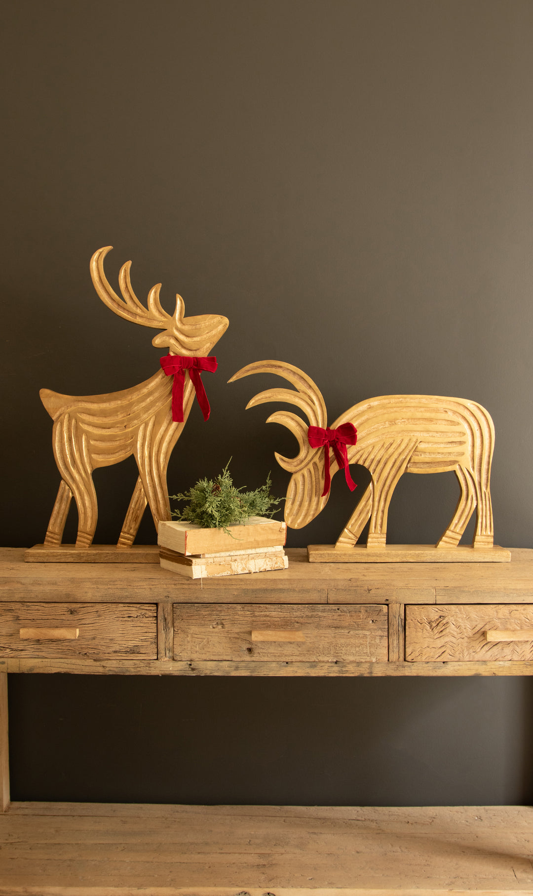 Set of 2 Carved Mango Wood Reindeer with Red Velvet Ribbon and Painted Gold Detail