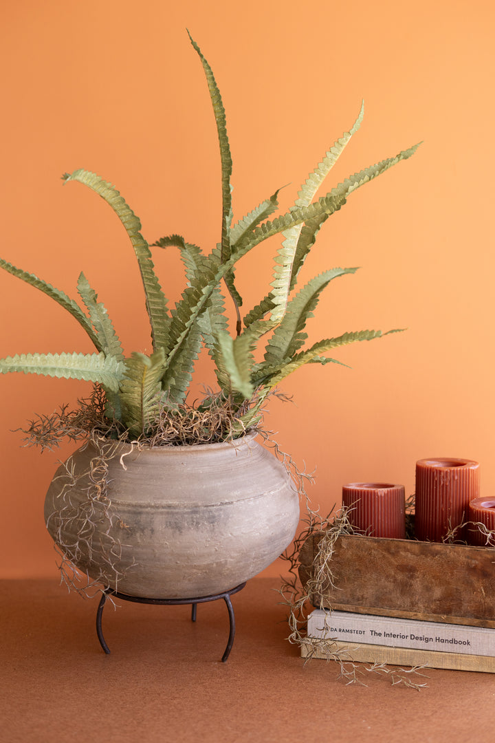Black Clay Urn on an Iron Stand