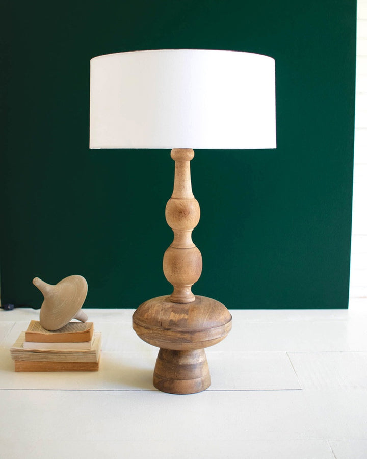 Carved Wooden Table Lamp With Off-White Barrel Shade