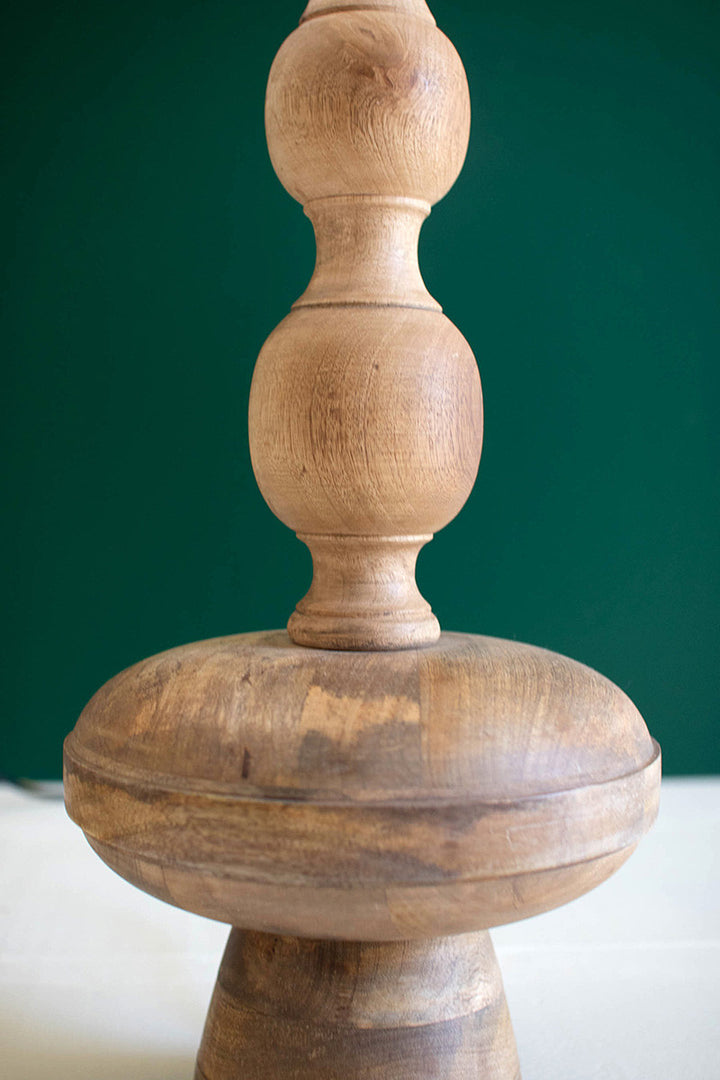 Carved Wooden Table Lamp With Off-White Barrel Shade