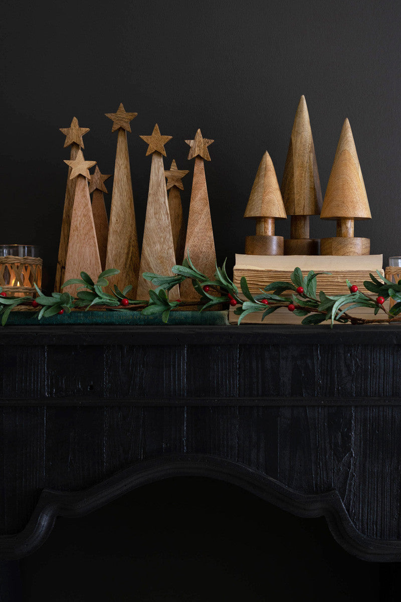 Seven Wooden Christmas Trees On A Base